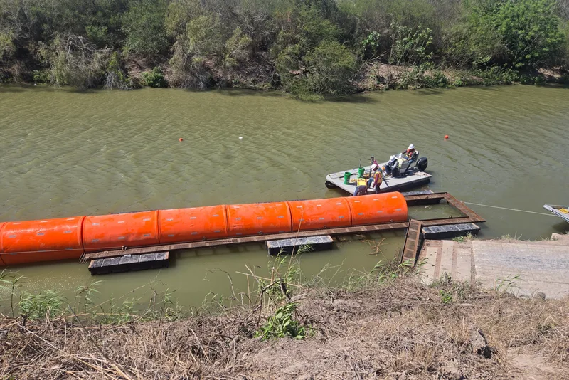 buoy on bank of rio grande Contractors install buoys in the rio grande in southmost brownsville