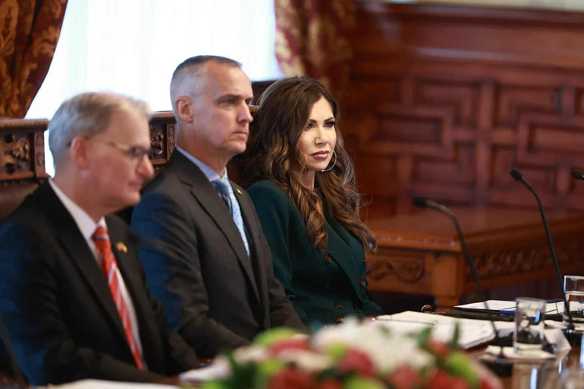 Corey lewandowski with kristi noem meeting with a foreign leader
