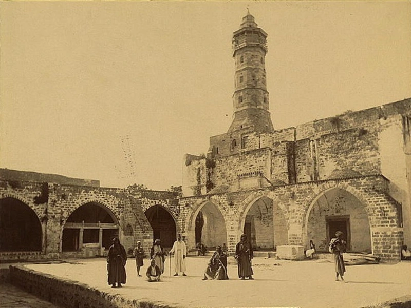Courtyard, arcades and minaret of the mosque, late 19th century