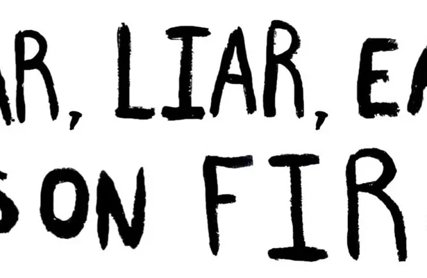 Climate protest sign about lying in politics