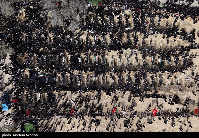 minab funerals 2 Aerial view of children’s graves in iran during funeral for elementary school bombing victims.