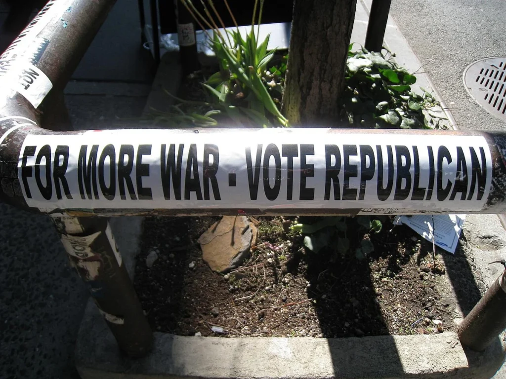 Sticker: For more war vote Republicans