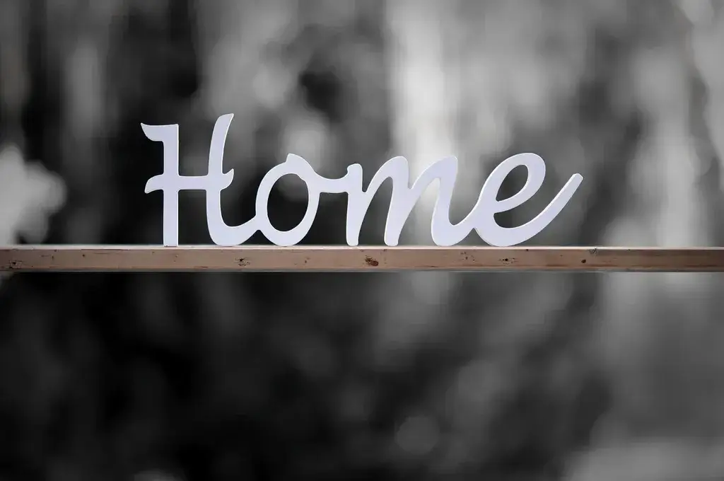 Wooden HOME decoration. The ROAD to Housing Act will help more families find theirs